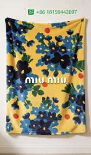 Miumiu Throw Blankets